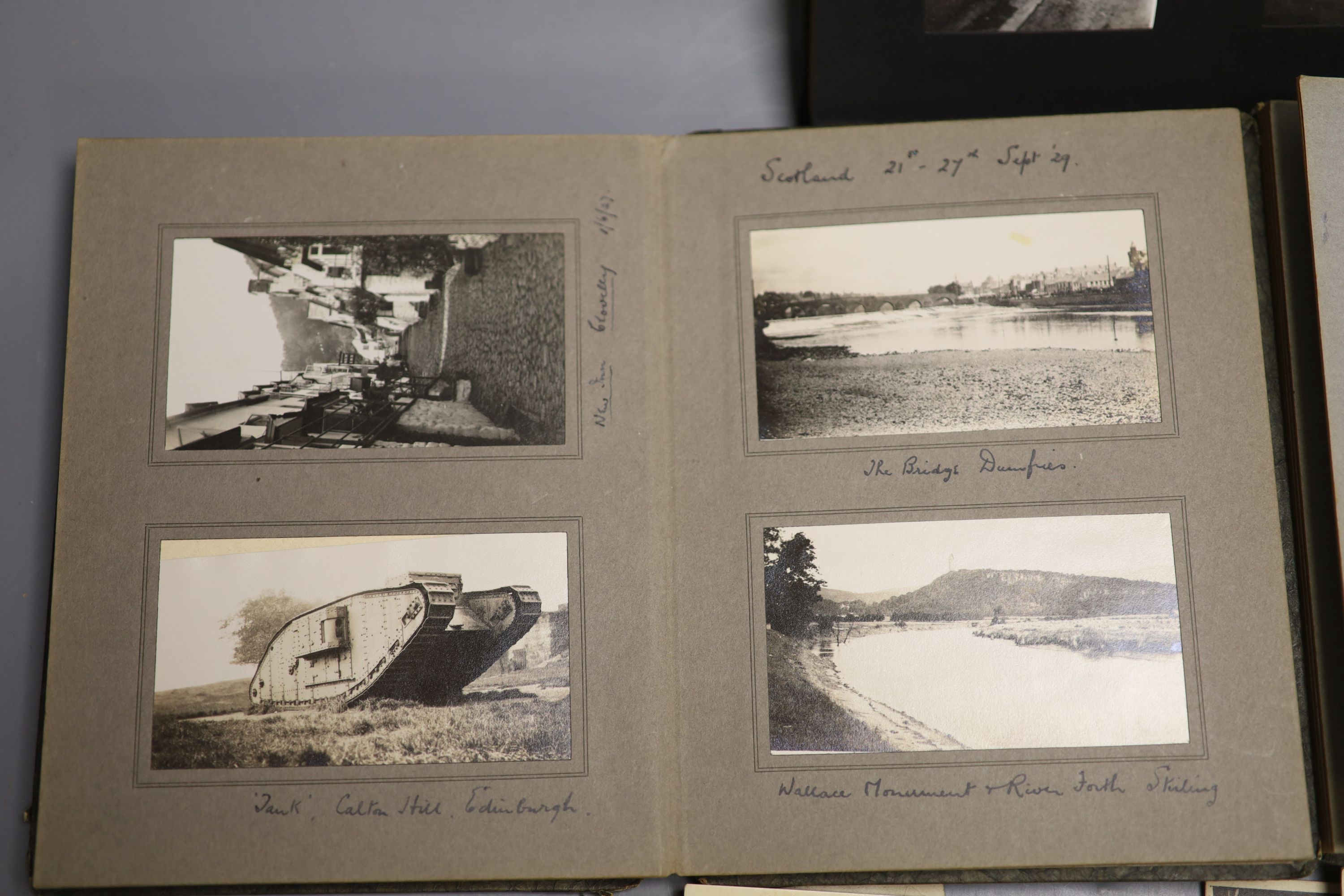 Three albums of photographs and a quantity of postcards inc. erotica.